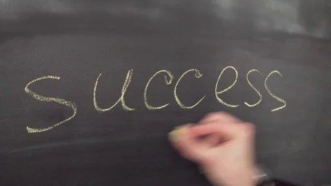 Hand writes the word success Stock Footage 81303422