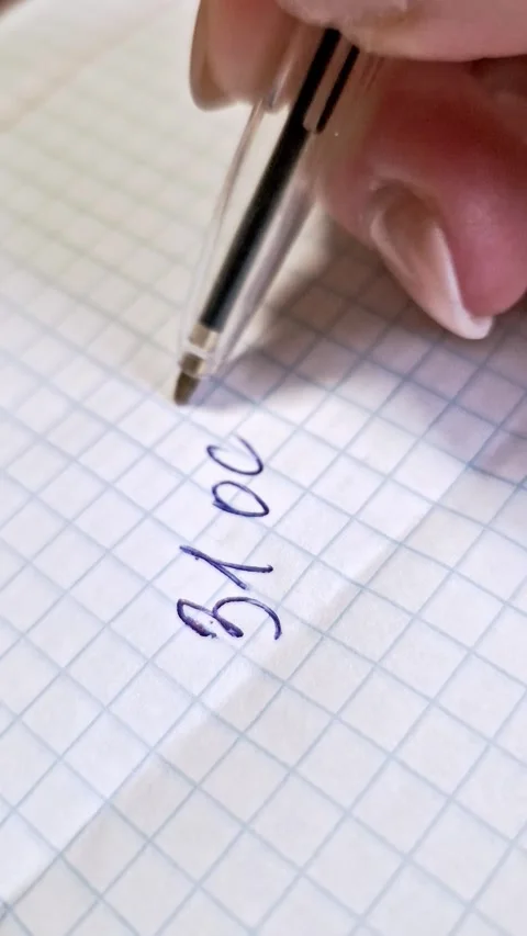 Hand Writing 31 October on Grid Paper Macro Shot Stock Footage 321645900