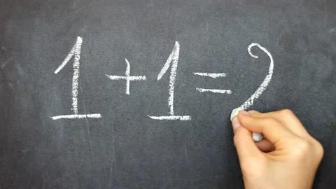 Hand writing on chalkboard mathematical example - one plus one exactly two Stock Footage 149743567