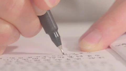 Hand Writing Chinese Characters with Grey Mechanical Pencil on Paper Vidéo 334848892