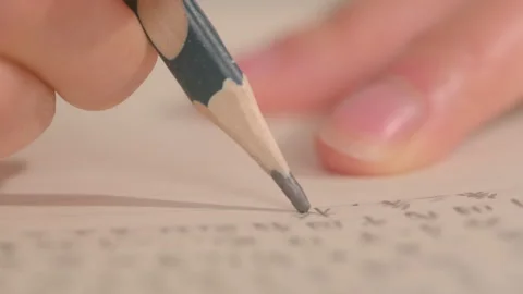 Hand Writing Chinese Characters on Lined Paper with Pencil Vídeos de archivo 334849508