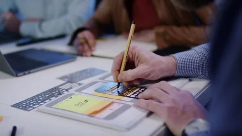 Hand Writing on Design Layouts with Pencil, Business Meeting, Close Up Shot Video stock 341452210