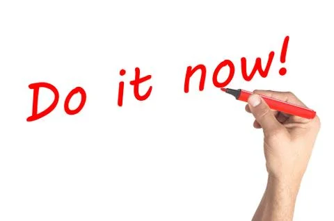 Hand writing Do it now on transparent board Stock Photos