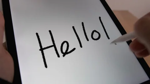 Hand writing “hello” on tablet with interactive pencil. 4k. Stock-Footage 107271079