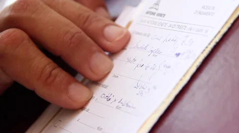 Hand writing an invoice 스톡 동영상 47176544
