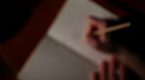 Hand writing jib down soft focus Stock Footage 47460328
