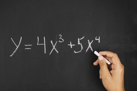 Hand writing math equation Stock Photos