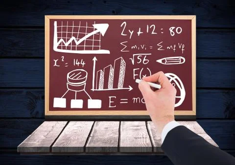 Hand writing math equations on blackboard Foto stock