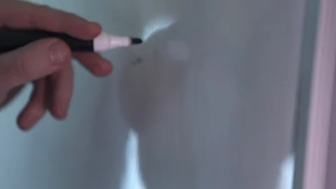 Hand writing a math formula on the board Stock Footage 102616542