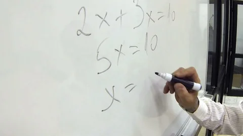 Hand Writing Math Formula for Elementary School on a Whiteboard Stock Footage 96517842