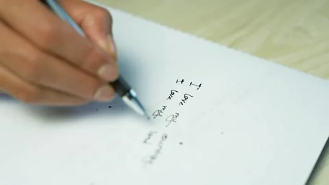 Hand Writing Math Notes on Paper, Close-up of a hand writing math notes wit.. Stock Footage 346484047