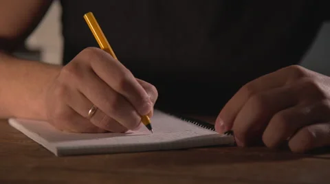 Hand writing in notebook Stock Footage 56463337