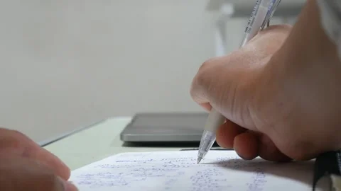 Hand writing on notebook. Stock Footage 243473161