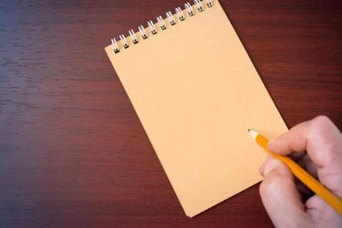 Hand writing in notebook Foto stock
