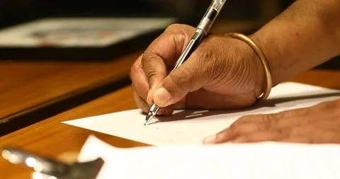 Hand Writing On a Paper Stock Footage 116461618