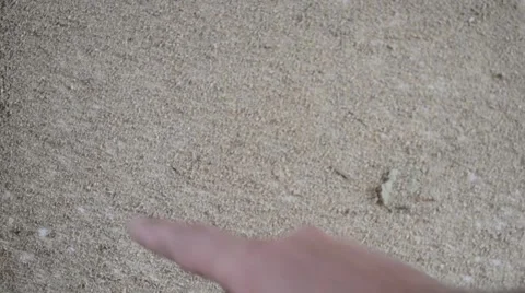 Hand writing on the sawdust Stock Footage 67286498