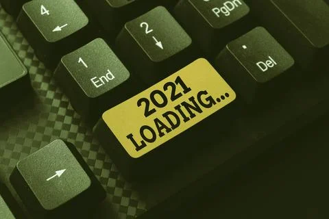 Hand writing sign 2021 Loading.... Concept meaning a year composed of a series Stock Photos