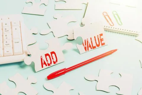 Hand writing sign Add Value. Conceptual photo an improvement or addition to Stock Photos