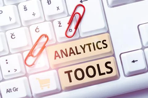 Hand writing sign Analytics Tools. Business overview pieces of web application Foto stock