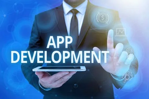 Hand writing sign App Development. Word for the act or process by which a mobile 库存照片