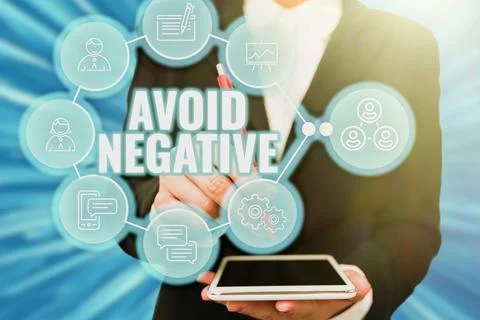Hand writing sign Avoid Negative. Business overview Staying away from Stock Photos