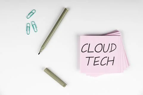 Hand writing sign Cloud Tech. Word Written on storing and accessing data and Stock Photos
