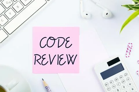 Hand writing sign Code Review. Internet Concept going over a subject in study or Stock Photos