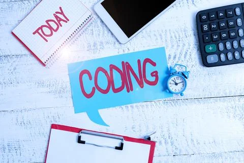 Hand writing sign Coding. Business overview assigning code to something for Stock Photos