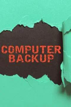 Hand writing sign Computer Backup. Conceptual photo the act of copying of files Stock Photos