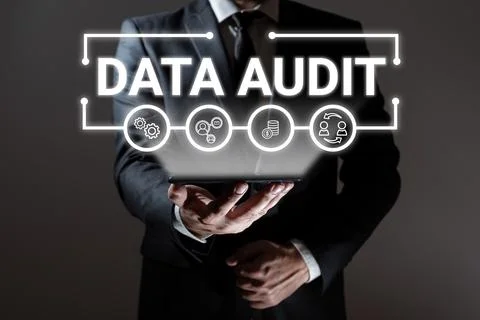 Hand writing sign Data Audit. Business showcase auditing of data to assess its Stock Photos