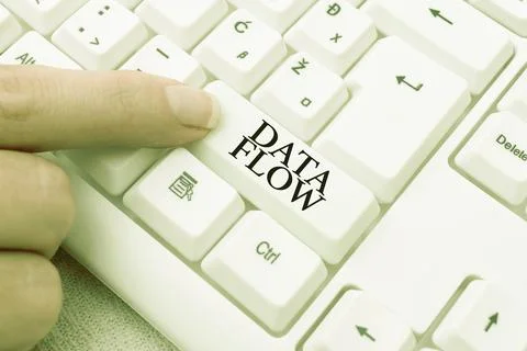 Hand writing sign Data Flow. Business showcase the movement of data through a 스톡 사진