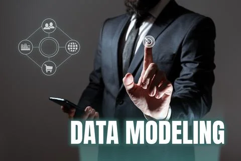 Hand writing sign Data Modeling. Word Written on process of transferring data Stock Photos