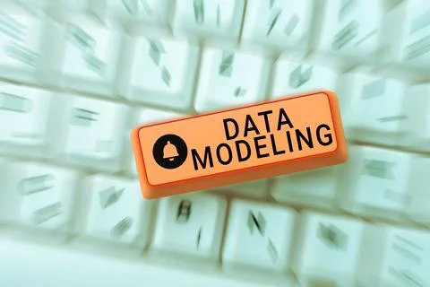 Hand writing sign Data Modeling. Business approach process of transferring data Stock Photos
