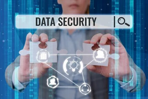 Hand writing sign Data Security. Business concept Confidentiality Disk Stock Photos