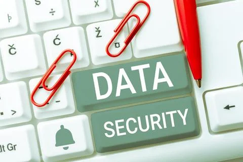 Hand writing sign Data Security. Business approach Confidentiality Disk Stock Photos