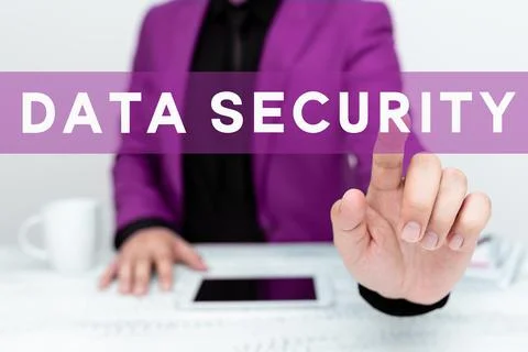 Hand writing sign Data Security. Business overview Confidentiality Disk Stock Photos