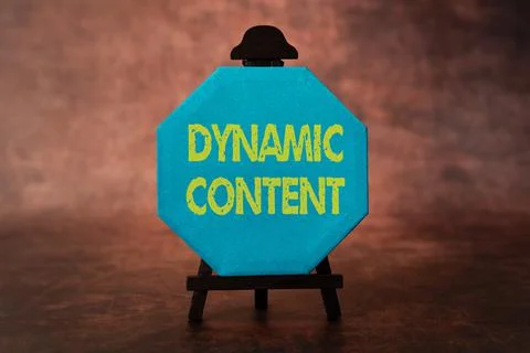 Hand writing sign Dynamic Content. Word for web content that changes based on Stock Photos