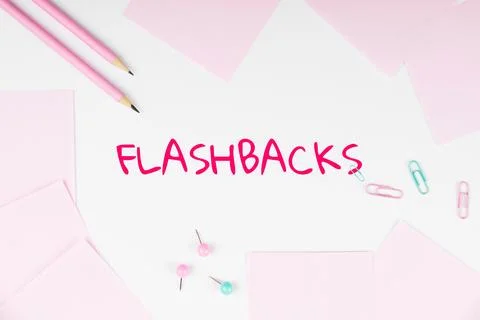 Hand writing sign Flashbacks. Internet Concept interruption of chronological Stock Photos