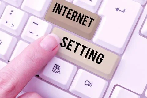 Hand writing sign Internet Setting. Word Written on etermines how it connects to Stock Photos