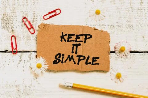 Hand writing sign Keep It Simple. Conceptual photo Easy to toss around Foto stock