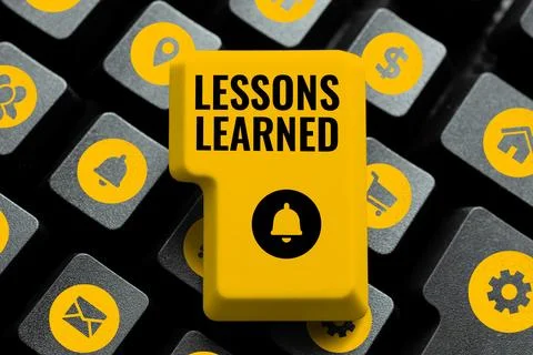 Hand writing sign Lessons Learned. Word for Promote share and use knowledge Stock Photos