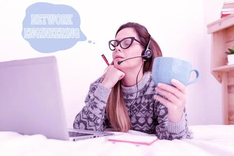 Hand writing sign Network Engineering. Concept meaning professional who has the Stock Photos