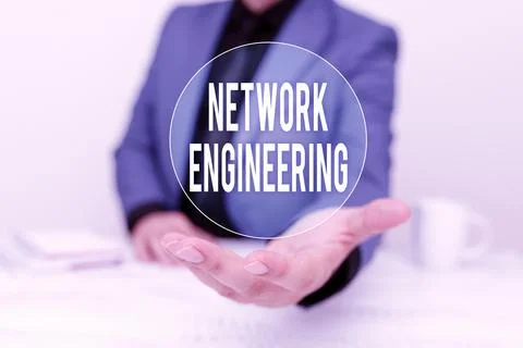 Hand writing sign Network Engineering. Business overview professional who has Stock Photos