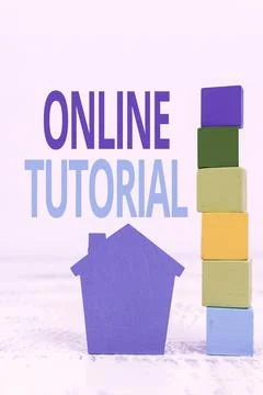 Hand writing sign Online Tutorial. Business concept process of tutoring in an Foto stock