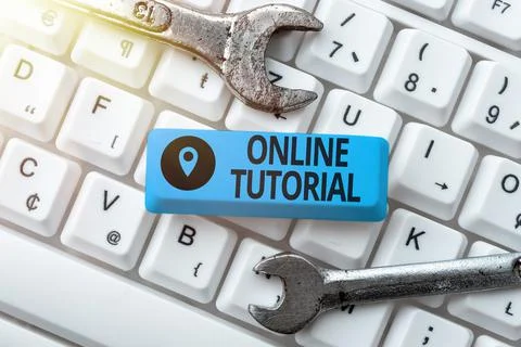 Hand writing sign Online Tutorial. Word for process of tutoring in an online or Foto stock