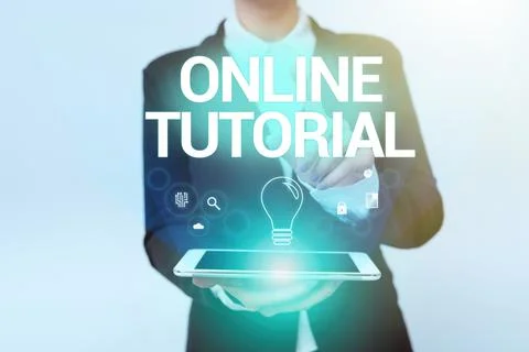 Hand writing sign Online Tutorial. Business overview process of tutoring in an Fotos de archivo