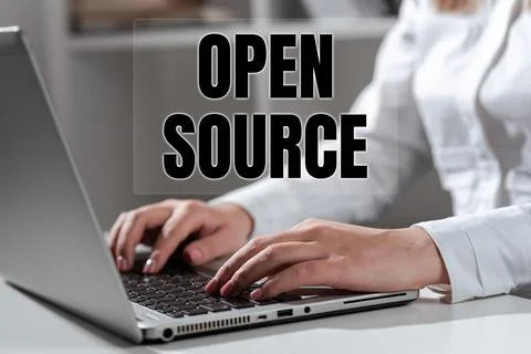 Hand writing sign Open Source. Business overview contains the source code that Stockfoto's