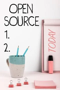Hand writing sign Open Source. Concept meaning denoting software which original Stockfoto's
