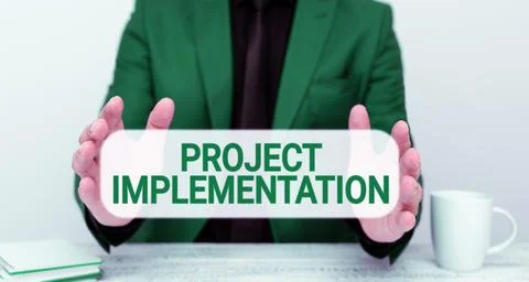 Hand writing sign Project Implementation. Business overview paying for start up Stock Photos