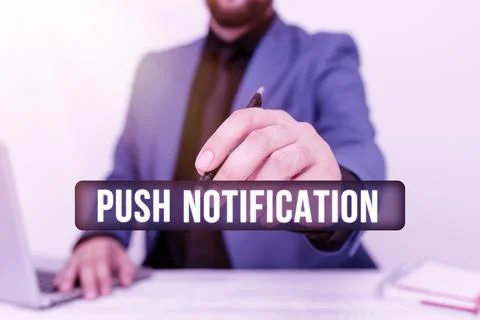 Hand writing sign Push Notification. Word for automated message sent by an Stock Photos
